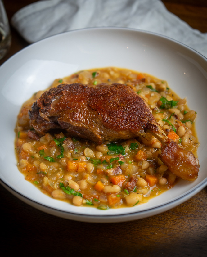 Cassoulet style French bean stew with confit duck