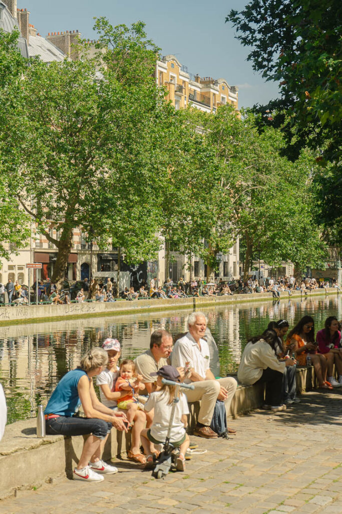 locals next to canal Paris